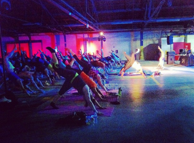 Countless three-legged dogs during the Under Armour Yoga Rave ...